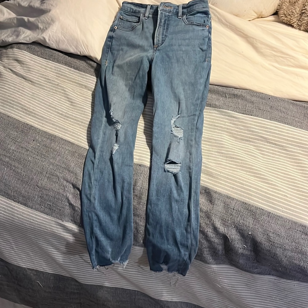 Ripped blue express jeans